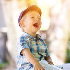 Boy-joyfully-singing-to-improve-learning-language-memory-and-focus-sing-to-thrive2